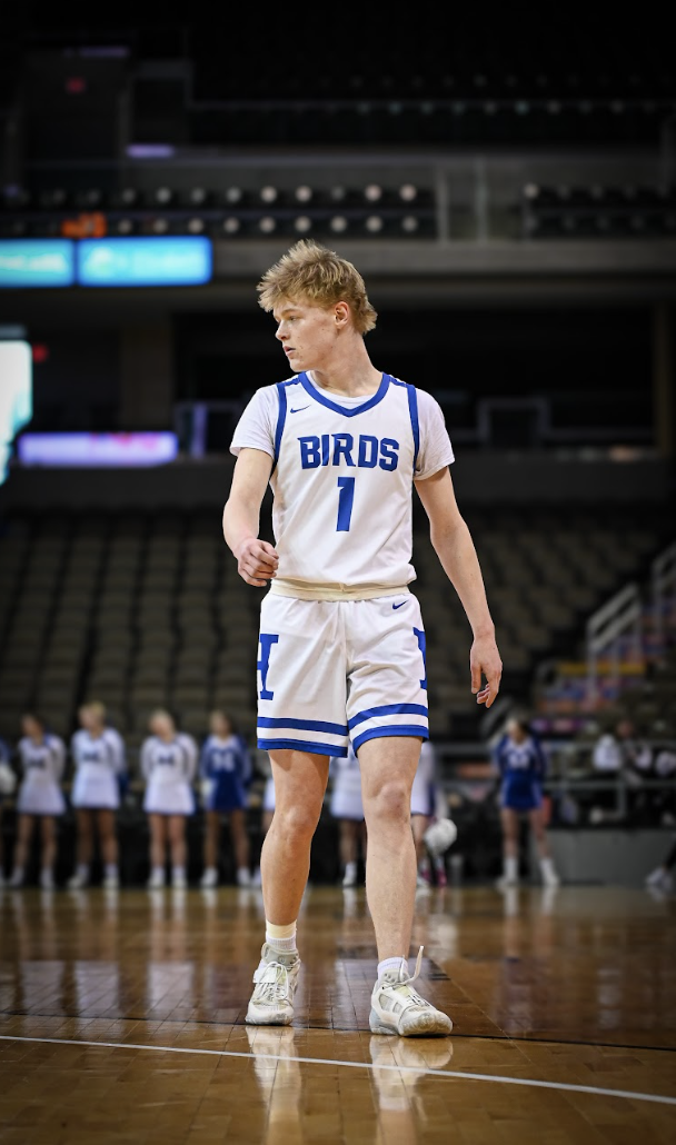 Finn Bouldin (11) walks down the court to reset for the next play. 